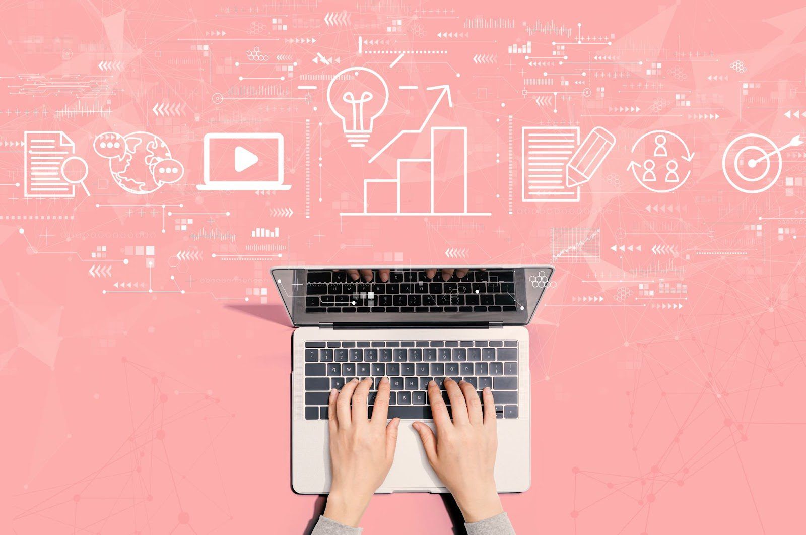 Hands typing on a laptop with digital icons representing ideas, growth, and connectivity on a pink background.